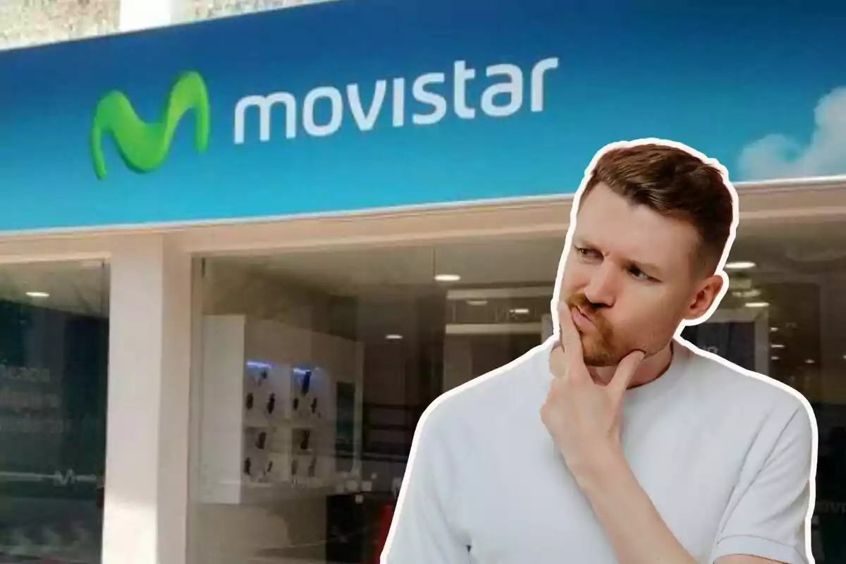 A pensive man in front of a Movistar store.