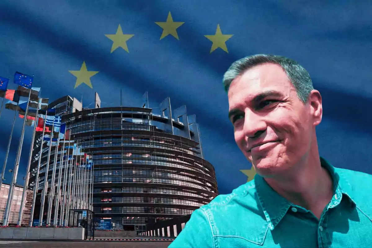 Un hombre sonriente frente a un edificio moderno con banderas y un fondo de la bandera de la Unión Europea.