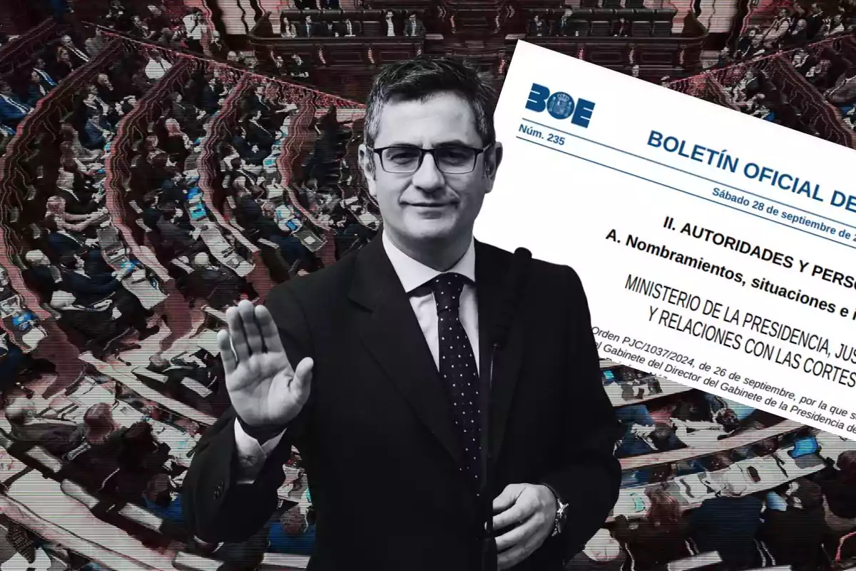 Un hombre con gafas y traje oscuro levanta la mano frente a un fondo de un parlamento y un boletín oficial.